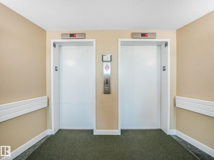 Property Photo: 6220 Fulton Road NW 211 AB T6A 3T4