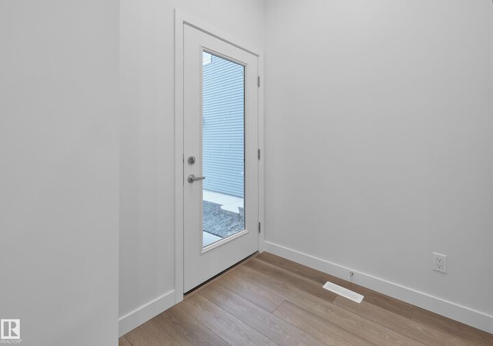 Property Photo: 9088 Elves Loop NW AB T6M 3G4