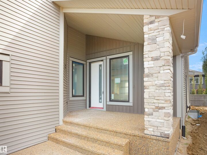 Property Photo: 4118 Ginsburg Place NW AB T5T 4V1