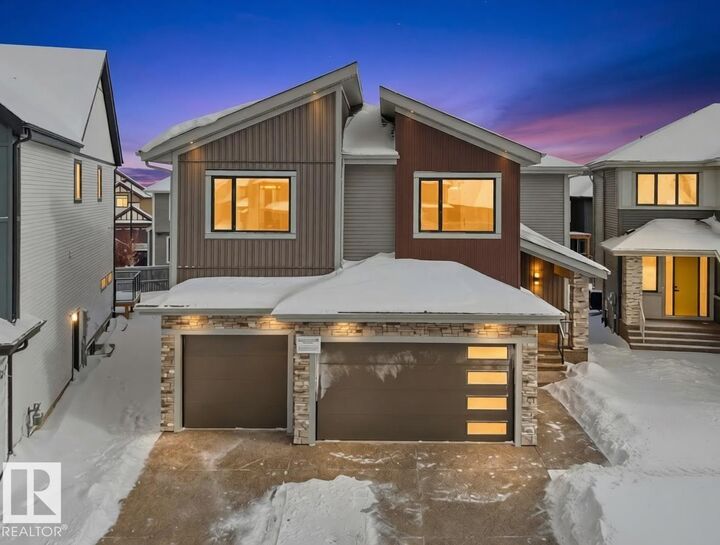 Property Photo: 4118 Ginsburg Place NW AB T5T 4V1