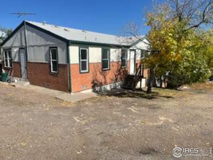 Property Photo: 3245 S Bryant St CO 80110
