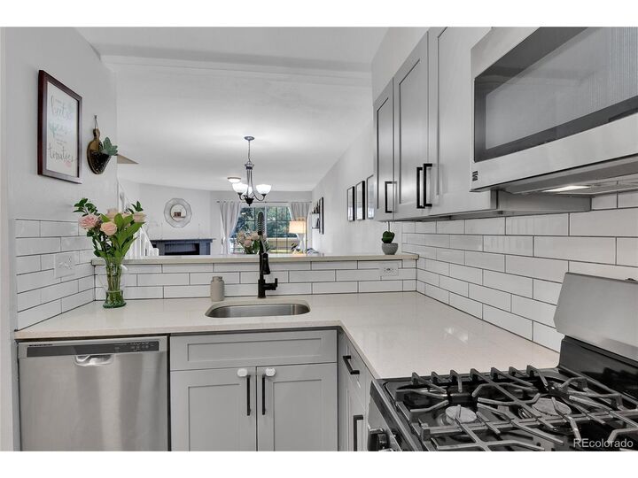 Property Photo:  1818 S Quebec Way 4-6  CO 80231 