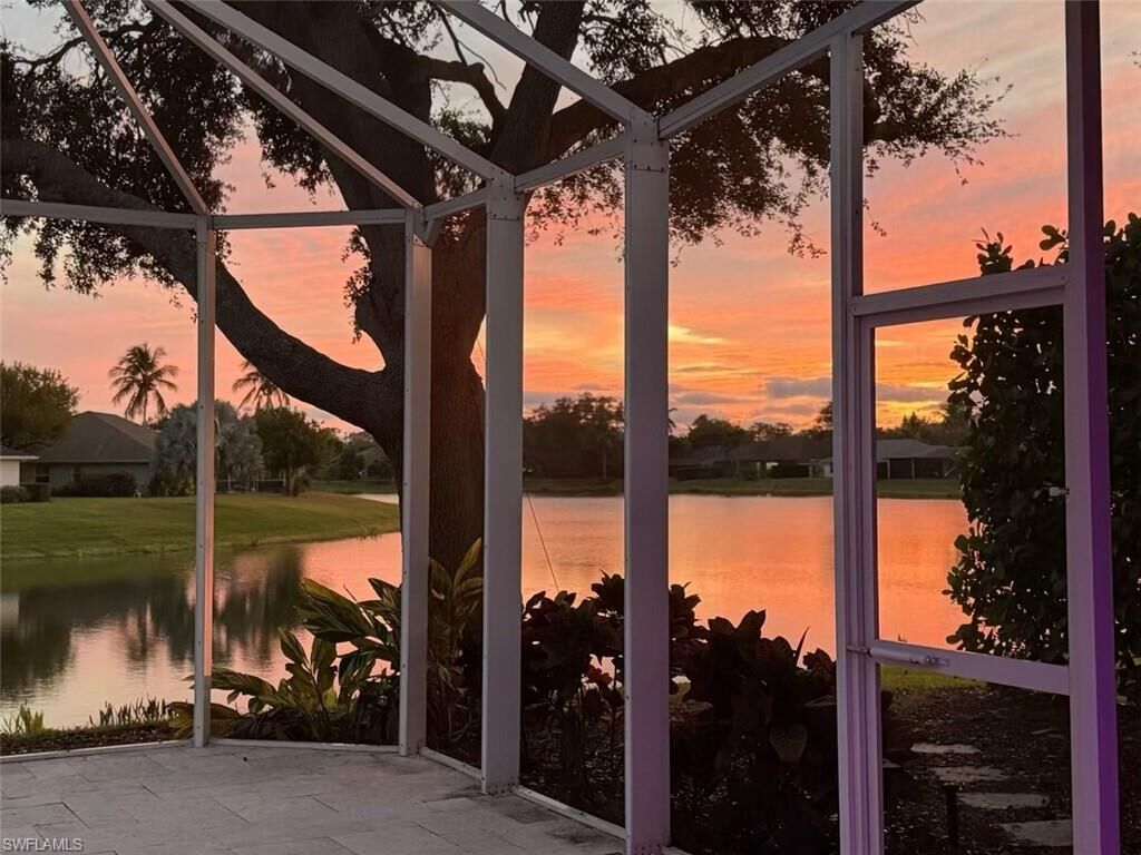 Property Photo: 9974 Boca Ave N FL 34109