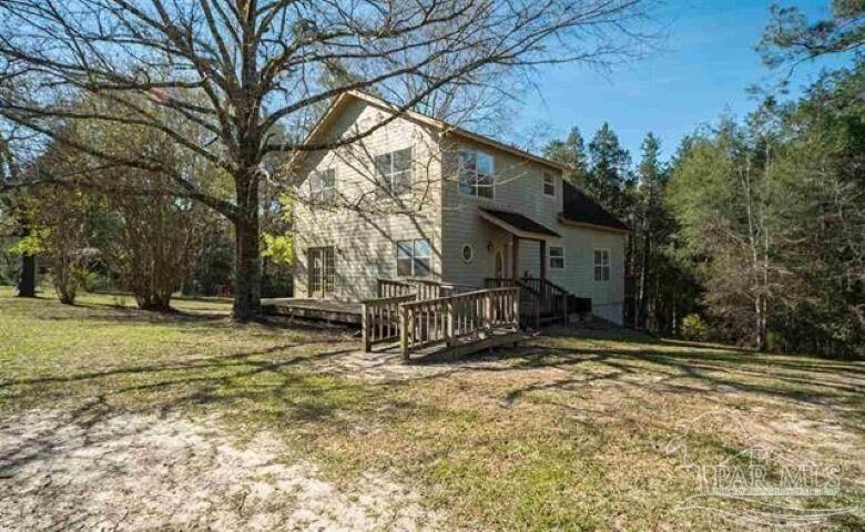 Property Photo: 9543 Quiet Creek Rd FL 32570