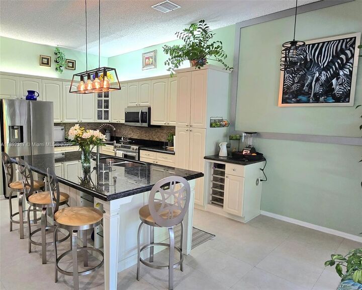 Property Photo:  1406 NW 159th Ln  FL 33028 