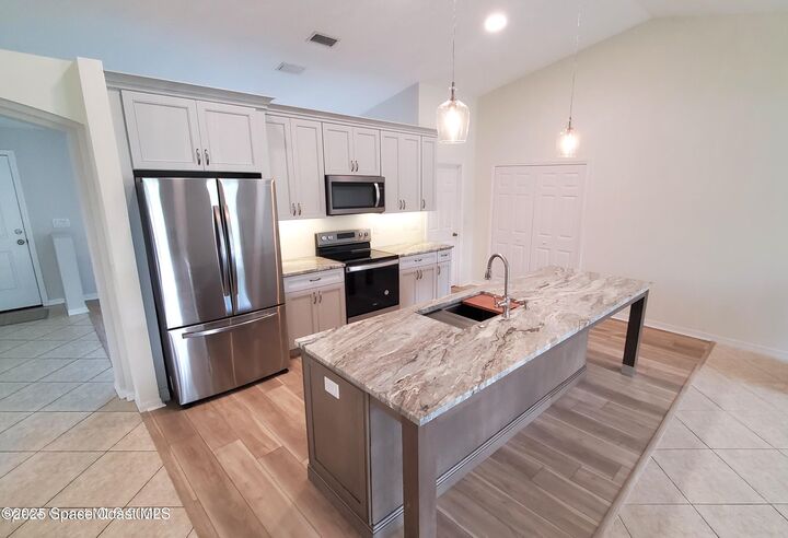 Property Photo: 5321 Cinnamon Fern Boulevard FL 32927