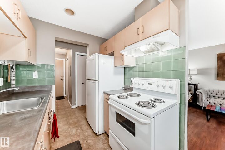 Property Photo: 12710 127 Street NW 305 AB T5L 1A5
