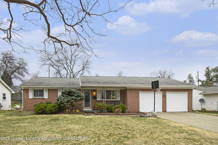 Property Photo:  2601 Newport Drive  MI 48906 