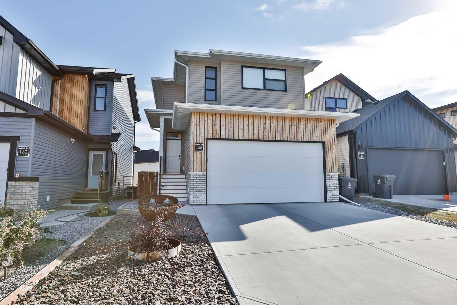 Property Photo:  158 Greywolf Road N  AB T1H 7G5 
