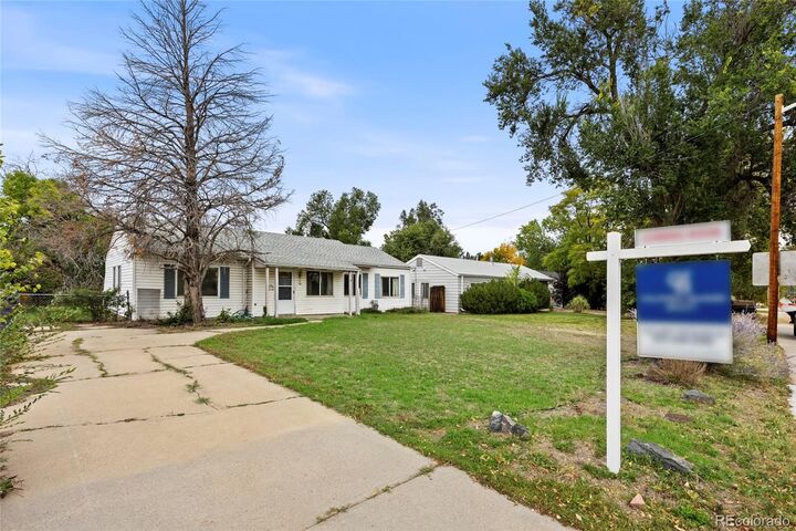 Property Photo: 3061 S Dahlia Street CO 80222