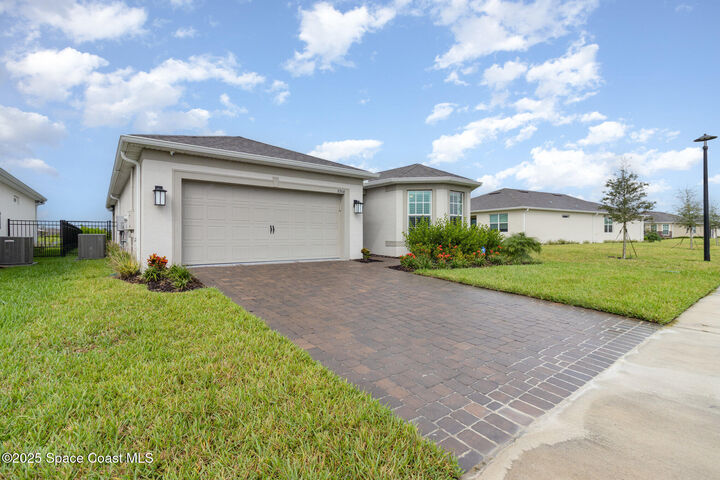 Property Photo: 8964 Nixie Avenue FL 32940