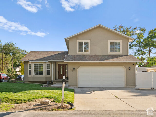 Property Photo: 218 E 7615 S UT 84047