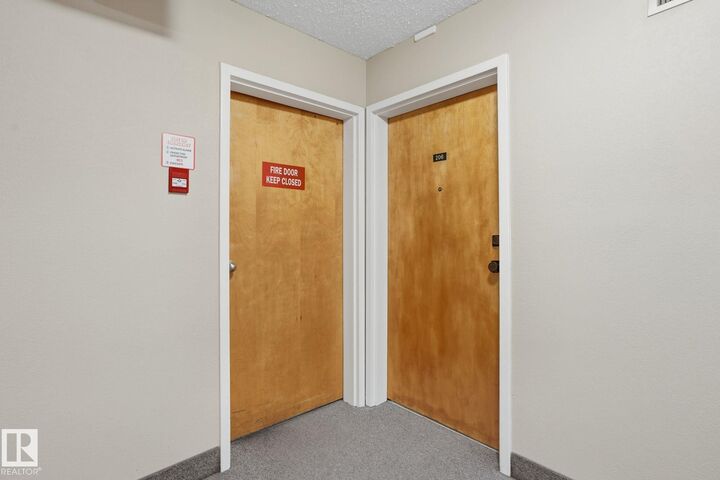 Property Photo:  6212 180 Street NW 206  AB T5T 2T2 