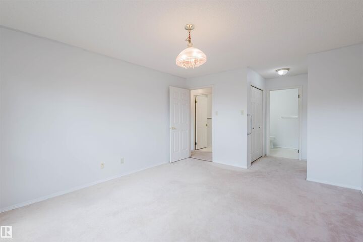 Property Photo: 11020 19 Avenue NW 402 AB T6J 9P5