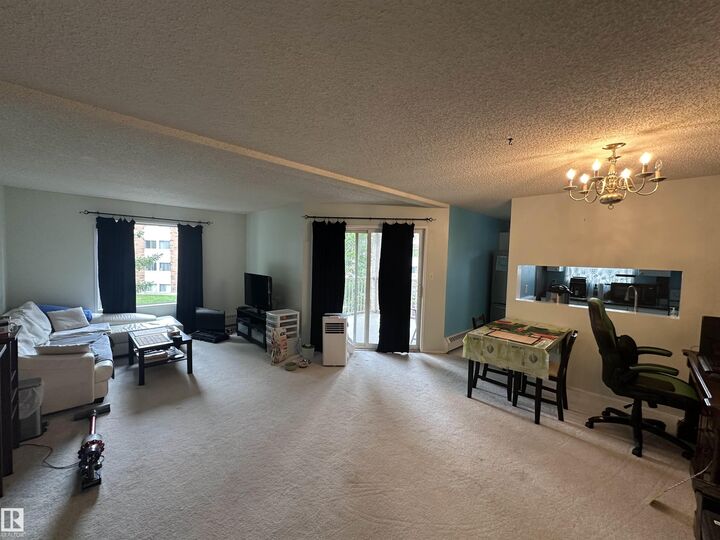 Property Photo:  17109 67 Avenue NW 318  AB T5T 6E6 