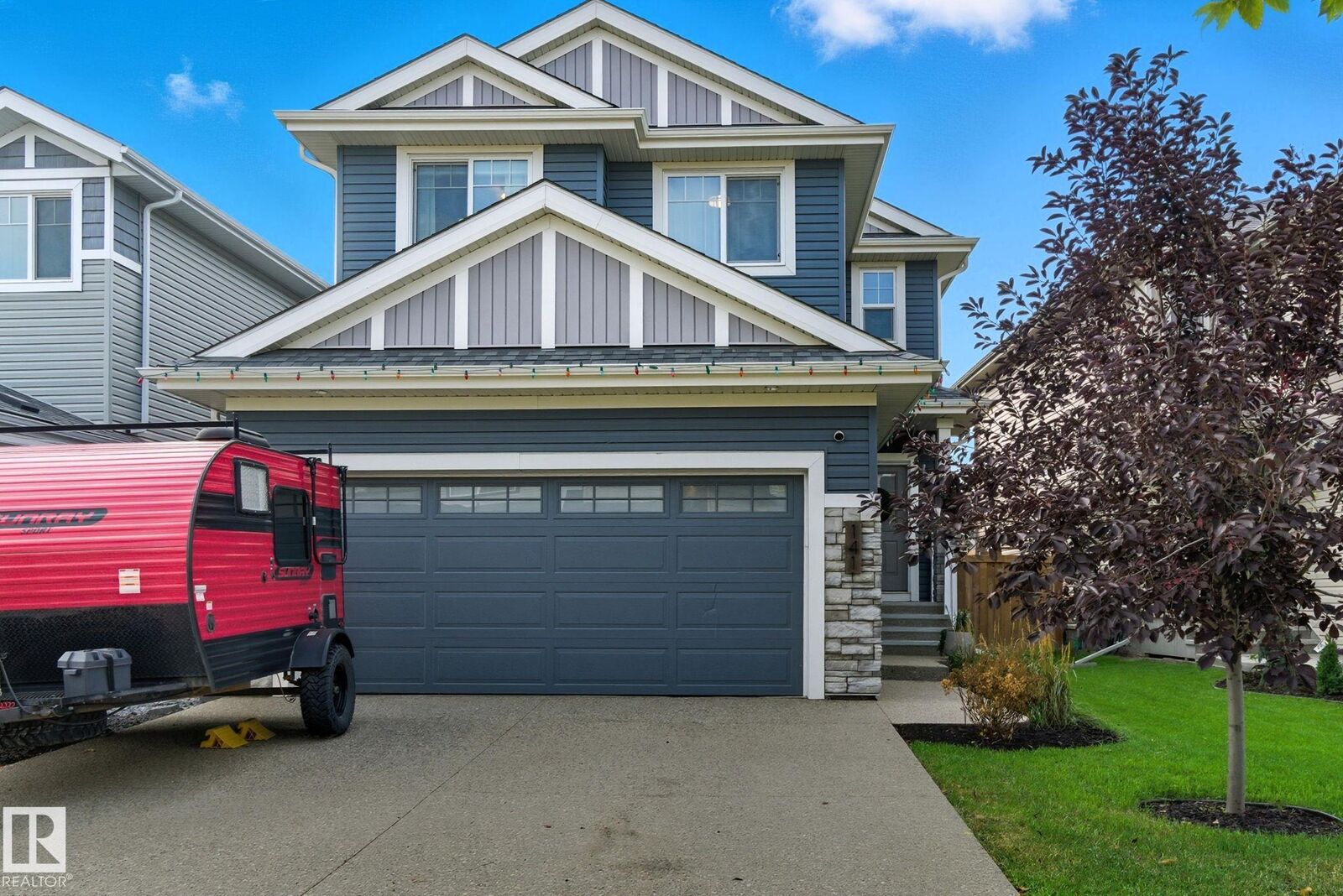 Property Photo:  141 Dansereau Way  AB T4X 2Y5 