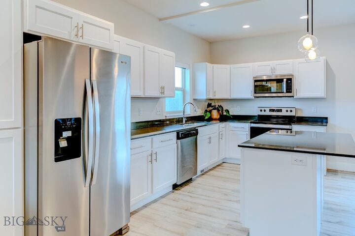 Property Photo:  817 Milky Way Drive B  MT 59718 