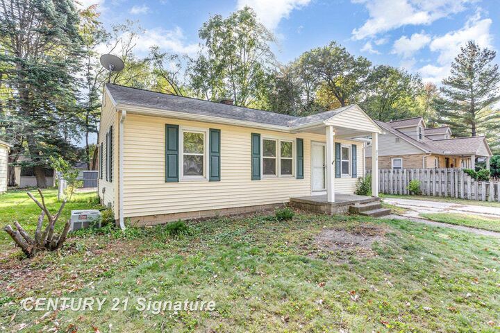 Property Photo: 310 E Sugnet Road MI 48640