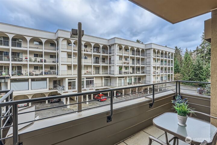 Property Photo: 10047 Main Street 206 WA 98004