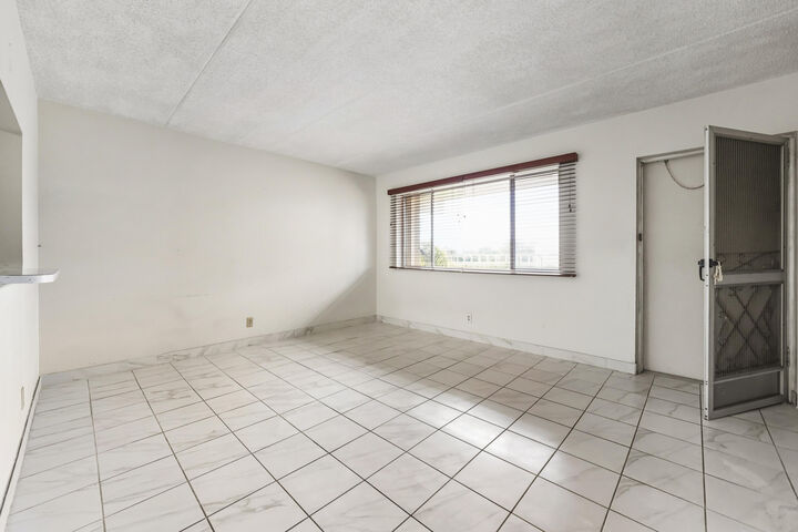 Property Photo: 400 Village Green Circle W 205 FL 33461