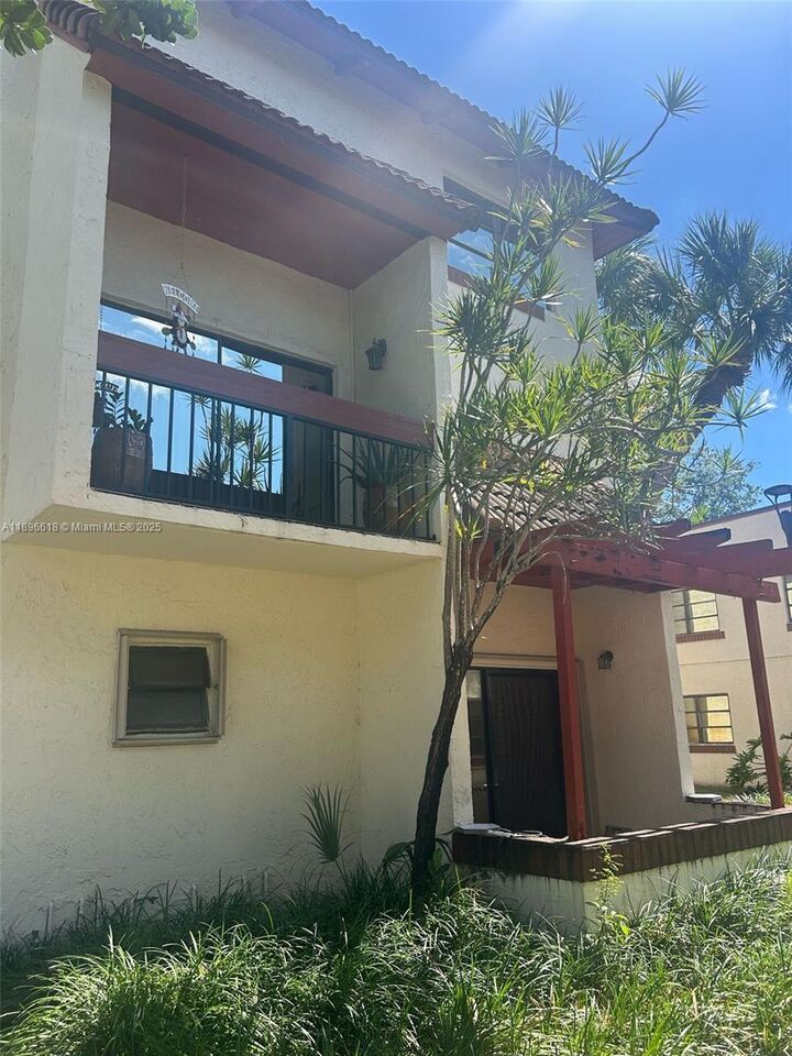 Property Photo:  8620 SW 149th Ave 418  FL 33193