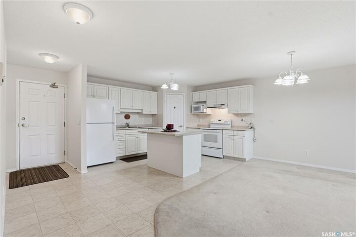 Property Photo: 934 Heritage View 210 SK S7H 5R9