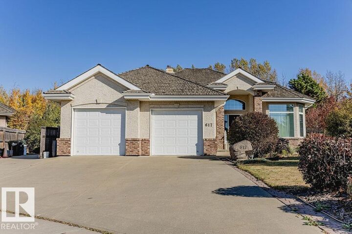 Property Photo: 617 Fountain Creek Circle AB T8B 1C9