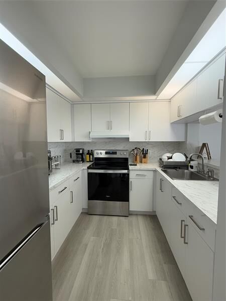 Property Photo:  12850 SW 4th Ct 203I  FL 33027 