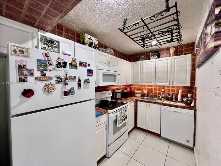 Property Photo: 17530 NW 68th Ave C4008 FL 33015