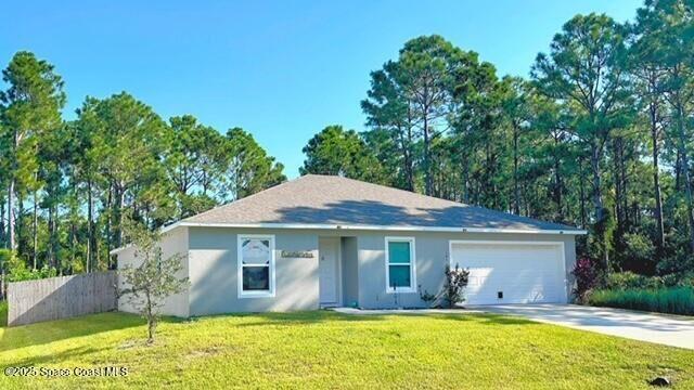 Property Photo: 141 SE Ensenada Street SE FL 32909