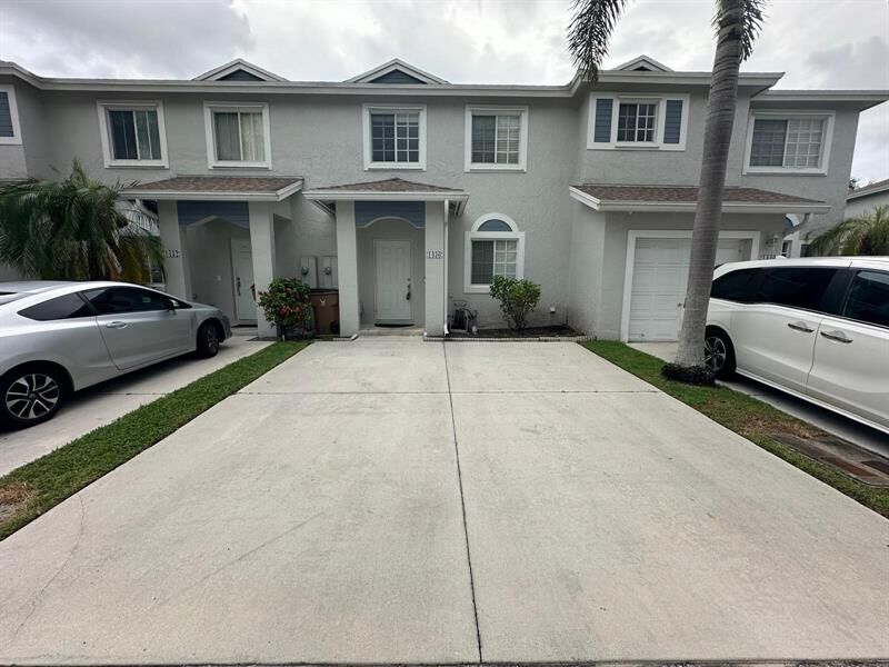 Property Photo:  1436 SW 47th Ave  FL 33442 