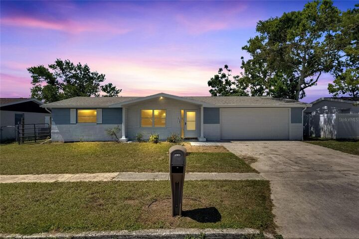Property Photo:  4923 Alcea Street  FL 34652