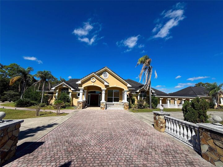 Property Photo:  4421 Reaves Road  FL 34746 