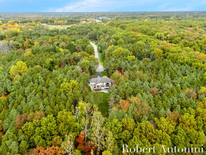 Property Photo:  4777 Windcliff Drive NE  MI 49341