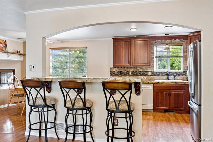 Property Photo:  5127 S Pagosa Street  CO 80015 