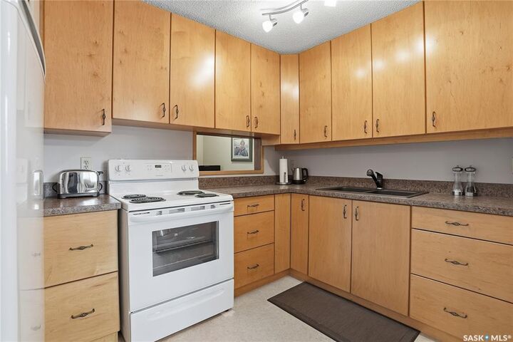 Property Photo: 1128 McKercher Drive 106 SK S7H 4Y7