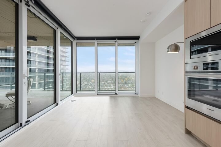 Property Photo:  4890 Lougheed Highway 3204  BC V5C 0N2