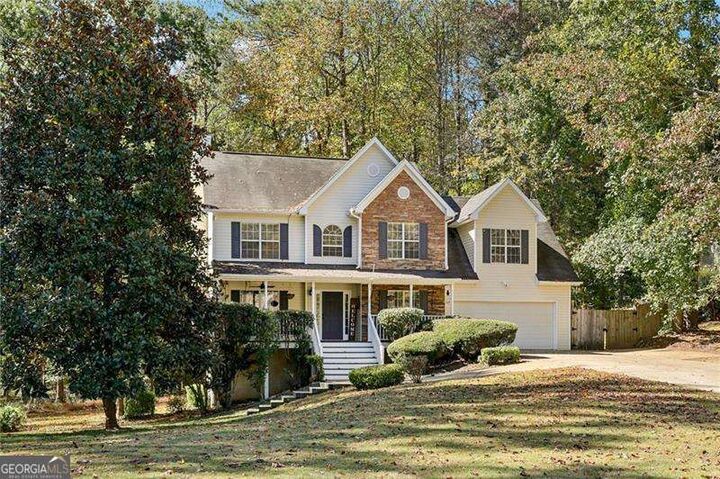 Property Photo:  7670 Rose Lane  GA 30040 