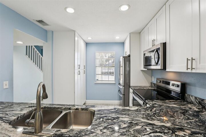 Property Photo:  6935 Lake Place Court 6935  FL 33634 