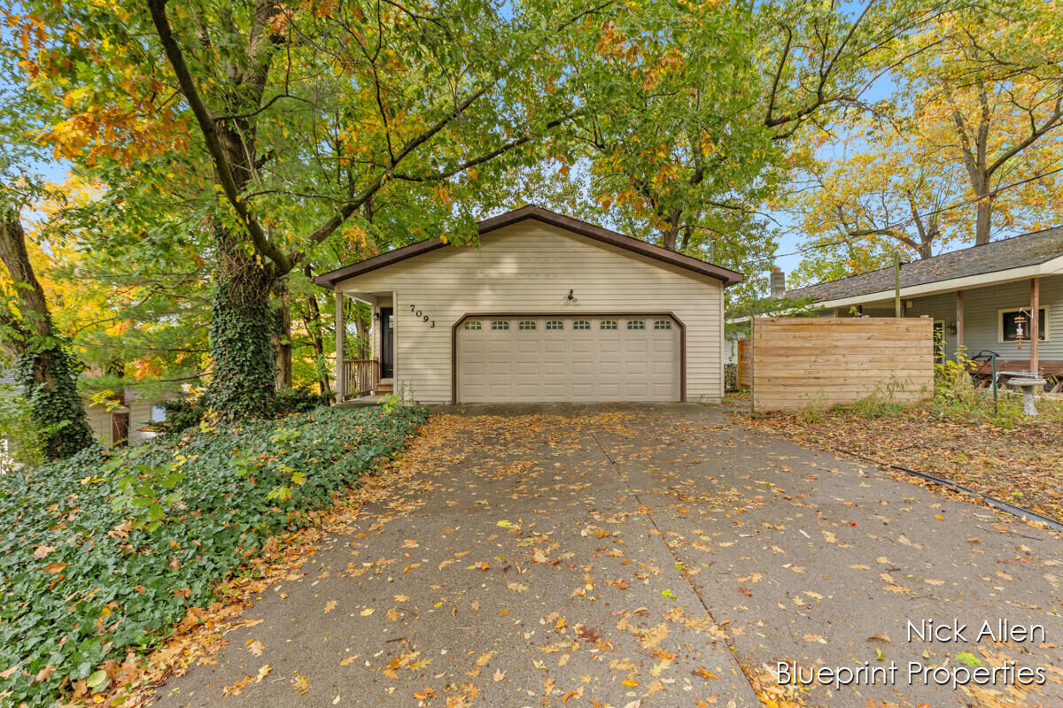 Property Photo:  7093 Peninsula Drive NE  MI 49341 