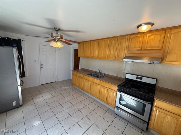 Property Photo:  1576 E 36th Street 2 Front  OH 44114