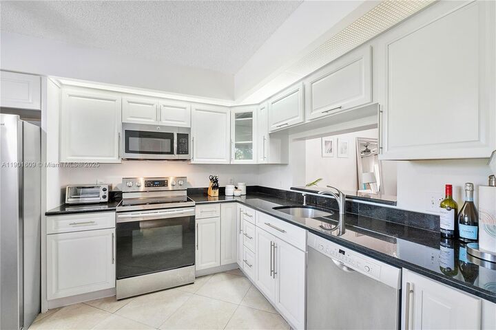 Property Photo:  1301 SW 142nd Ave 203H  FL 33027