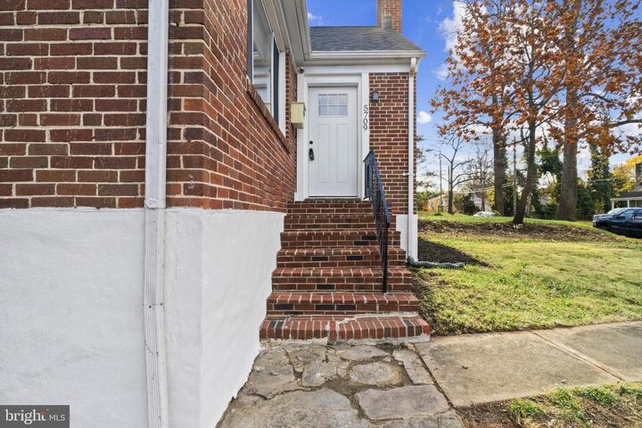 Property Photo: 5709 Woodcrest Avenue MD 21215