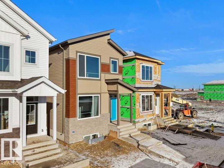 Property Photo: 432 Crystal Creek Link AB T9E 0X5