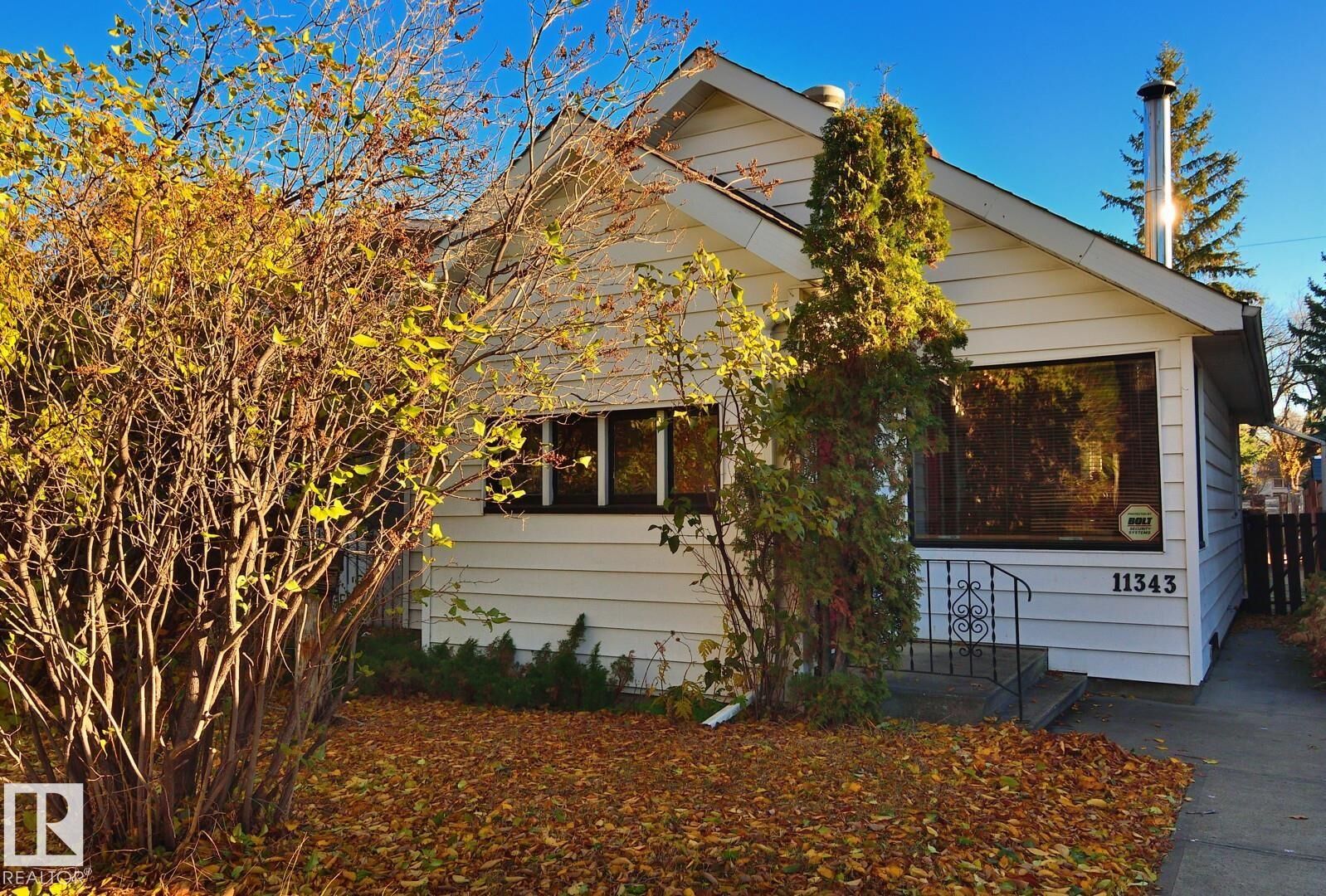 Property Photo:  11343 69 Street NW  AB T5B 1R8