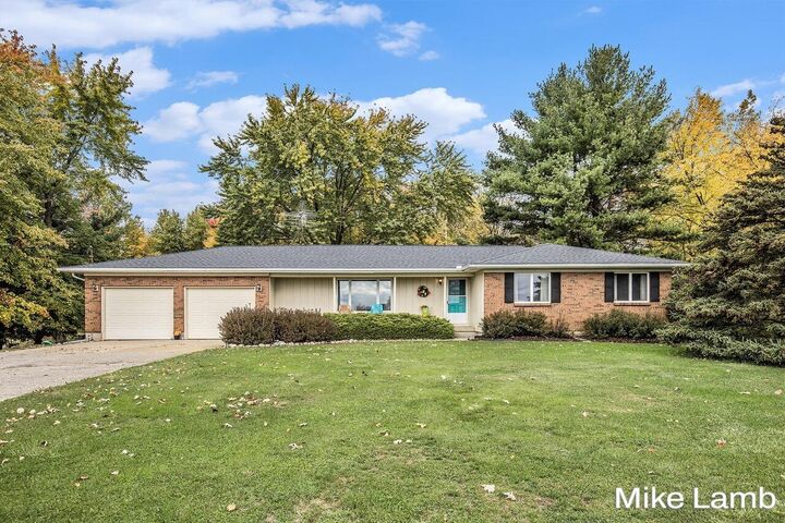 Property Photo:  3825 14 Mile Road NW  MI 49345 