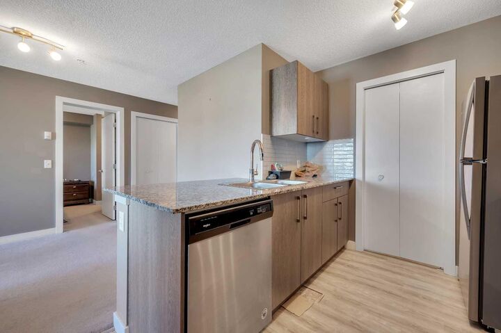 Property Photo:  4641 128 Avenue NE 4206  AB T3N 1T5