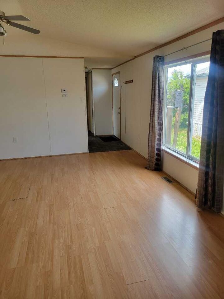 Property Photo:  9006 87 Avenue  AB T8X 1V6
