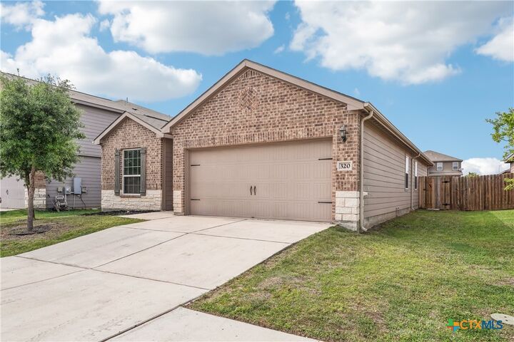 Property Photo:  320 Freedom Park Avenue  TX 78642 