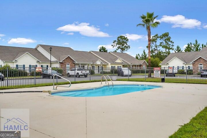 Property Photo:  401 Barry McCaffrey Boulevard K2  GA 31313